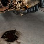 Why does oil leak from car banner