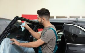 How to get window tint glue off car windows
